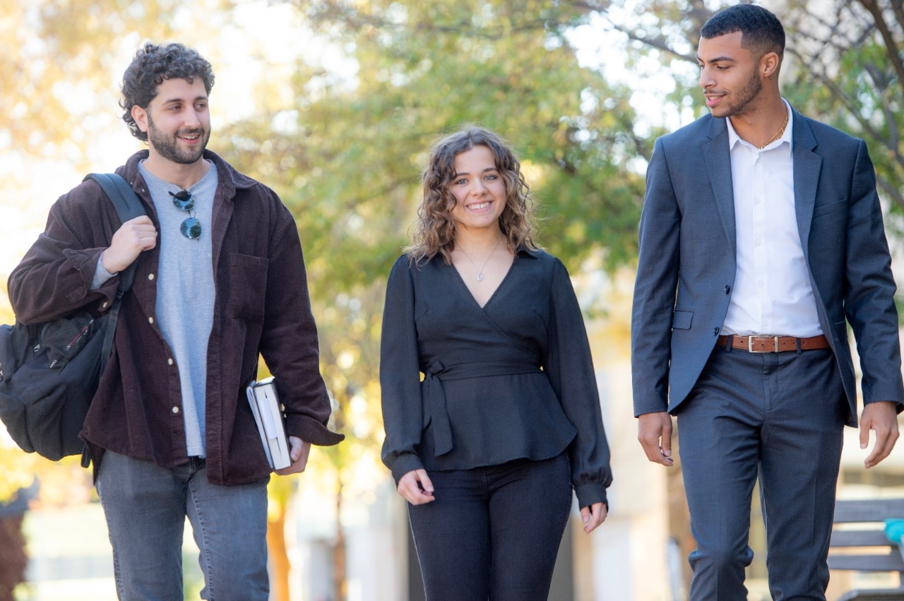 Three Chase Law students on campus