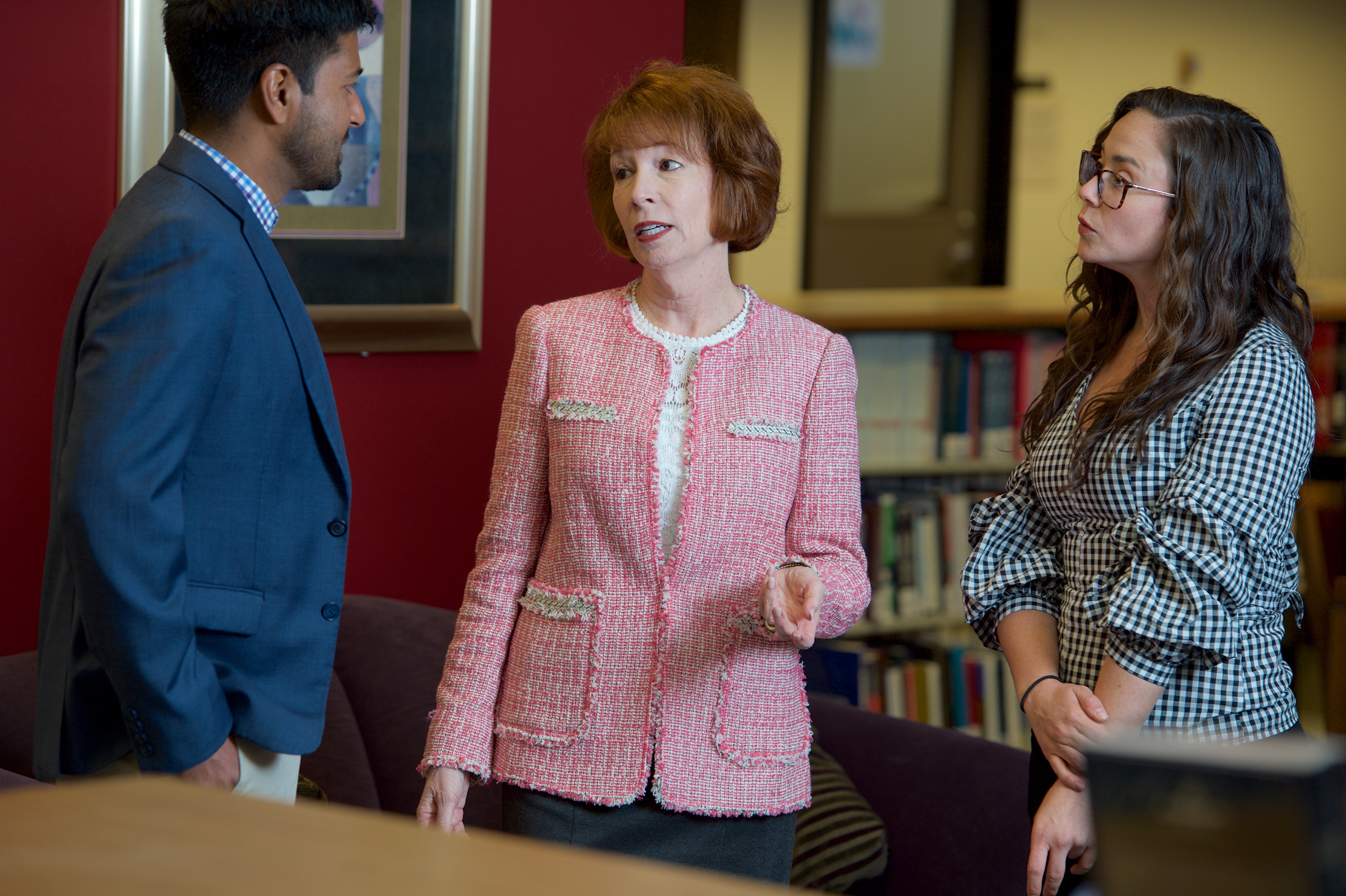 Dean Daar talking with students in Chase Law Library